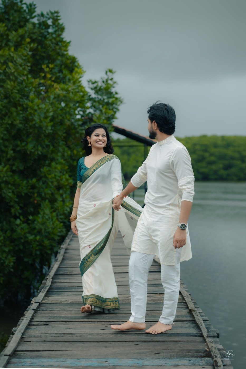 Walking on a wooden jetty over water
